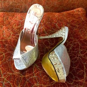 NWOT! Sequins semi spiked silver heels, about 4 to 5 inches high.